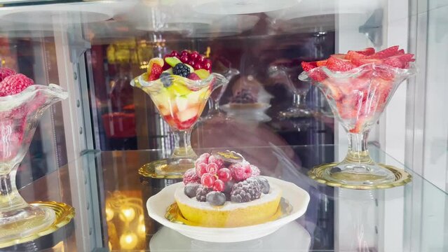 Delicious desserts inside a display case