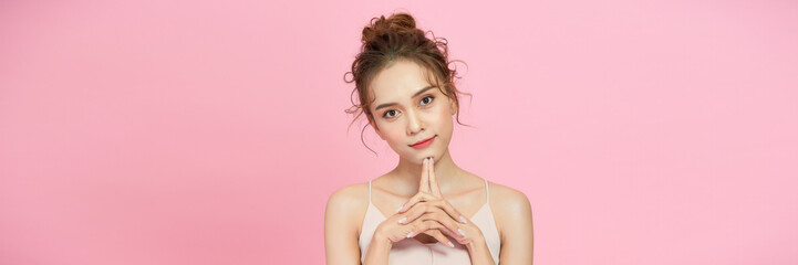 Casual beauty concept of pretty Asian girl on pink background