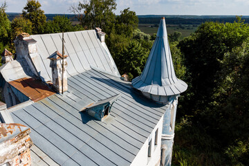 View from the roof of an old mansion with a tent canopy on the tower. Vorobyovo Estate, Russia