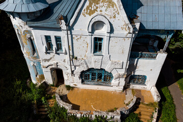 Fototapeta na wymiar Drone view of the main house with the tower of the Vorobyovo estate, built at the beginning of the 20th century. Kaluga region, Russia