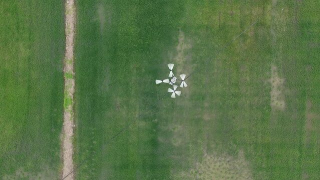 agricultural uav working over field