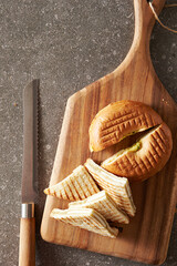 Bagels and kaya toast on cutting board