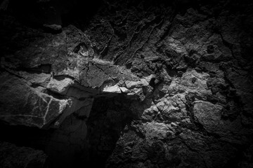 Weathered stone background. Black and white rock surface texture.