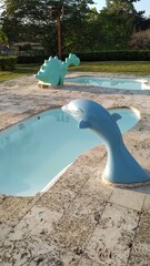 toddler pools with decorative animals © cristhian