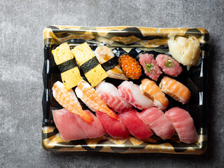 Different types of sushi on a plate	