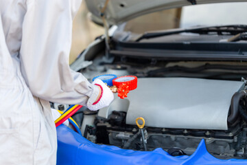 Repairman check and fix car air conditioner system, Technician man checks car air conditioning system refrigerant recharge, Car Air Conditioning Repair