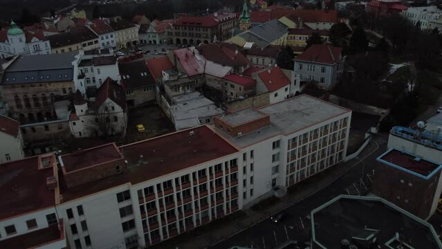 Drone view of Czech landscape with aged rooftops and small squares
