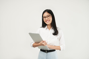 Portrait of a young Asian millennial college student holding a laptop, wearing a white shirt and glasses, isolated on a white background. Student concept.