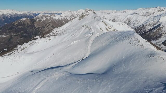 Genepi ski run at Les Orres ski resort the highest trail aerial drone shot