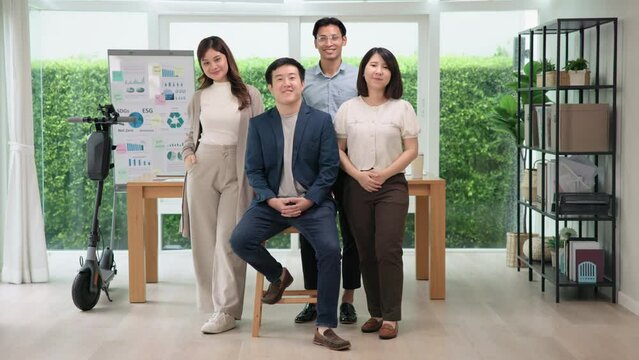 Save The Earth Planet Climate Change Social ESG Support Office Net Zero Waste Go Green Unity Diverse Asian Team. Group SDGs Asia Gen Z People Happy Health Workforce Smiling Relax Joy Looking At Camera