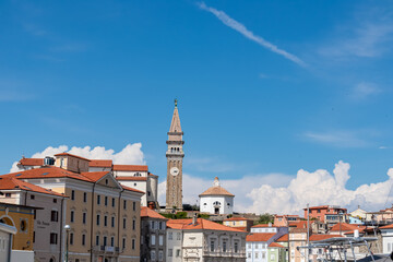 Scenic view of cathedral St George seen from serene harbor of coastal town Piran, Slovenia, Europe....
