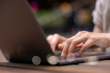 Social media marketing concept. Women hand using comupter typing, chatting conversation..