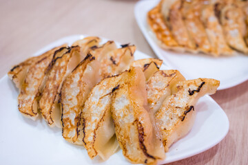 Pan fried meat dumpling in restaurant