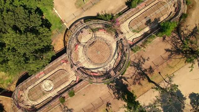 Aerial Drone Fly 360 Above Greenhouse Metallic Structure in Public Square Park, Green Trees, Fence Architecture, Invernadero de la Quinta Norma