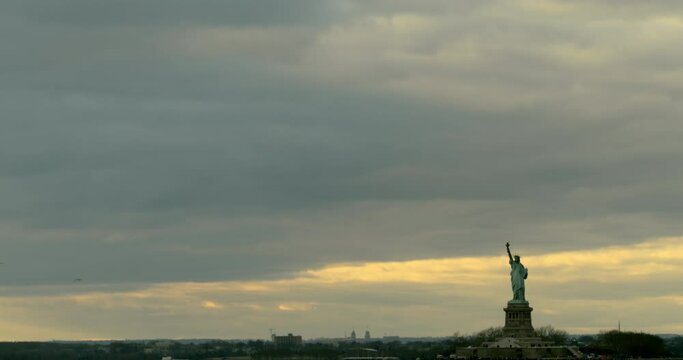 Statue of Liberty at Sunset with Heavy Cloud Coverage