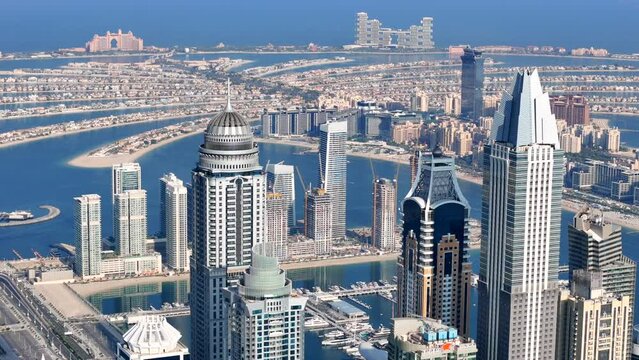 Aerial view of Dubai Marina. Dubai Marina is an affluent residential neighborhood known for The Beach.