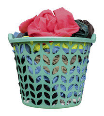 Green laundry basket with colorful clothes
