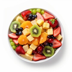 Bowl of fresh fruit salad isolated on white background, top view