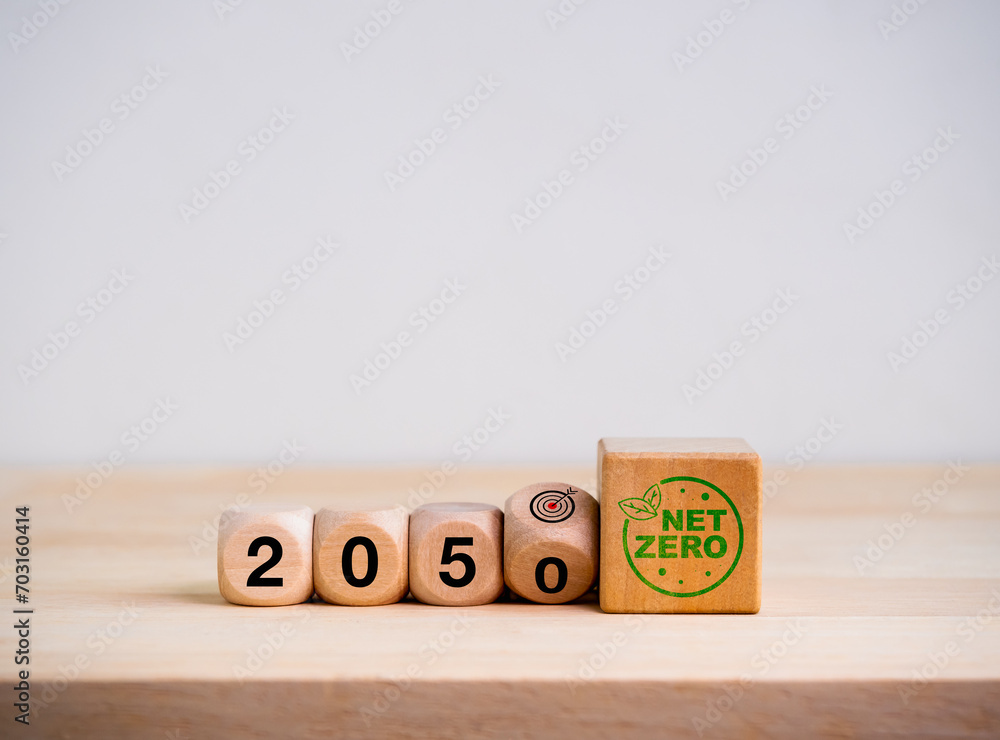 Aufkleber 2050 year number on flipping block with target icon isolated on white background. net zero by 2050. 