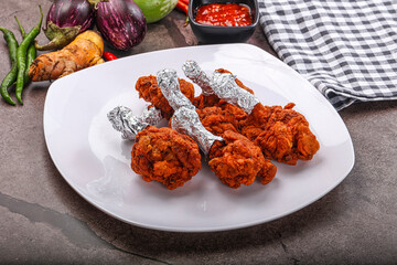 Indian cuisine glazed chicken lollipop