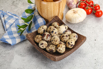 Raw quail eggs in the bowl