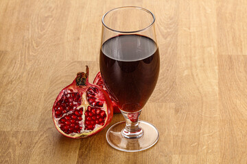 Sweet pomegranate juice in glass