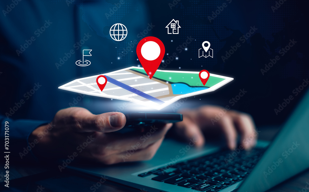 Fototapete man using laptop with virtual world and model map with location point , gps app, icon travel maps an