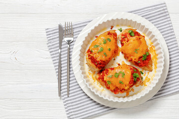 baked juicy chicken breasts with tomatoes, cheese