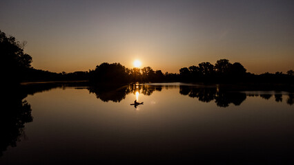 Sap board on the lake at dawn