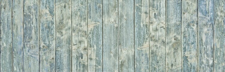 Background of old vintage cracked rough blue wood vertical planks in Provence style
