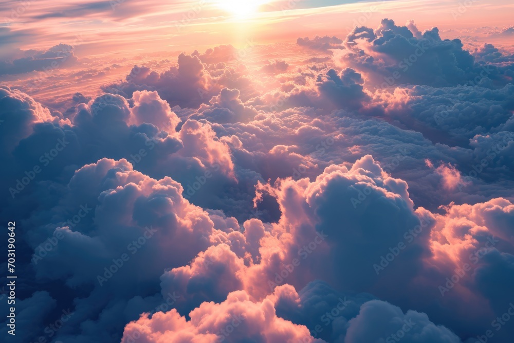 Poster A beautiful sunset with vibrant colors shining through the clouds. Perfect for adding a touch of serenity and warmth to any project