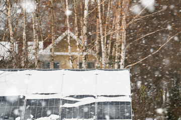 Efficient and Safe Energy Generation with Photovoltaic Technology. Photovoltaic electricity installation during the winter season. Alternative energy home production in cold weather.