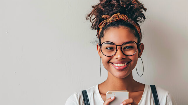 Portrait Of Young Happy Woman Sending Mobile Messages On White Background