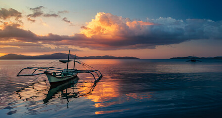 Serene Seascape with Islands and Bangkas after Sunset - obrazy, fototapety, plakaty