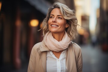 Mature woman smiling on the street