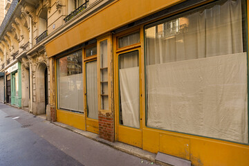 french boutique facade , yellow parisian storefront template , vintage shop entrance door