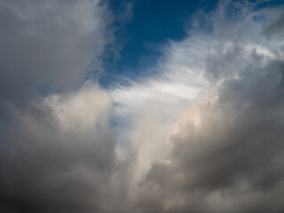 Fototapeta na wymiar Dramatic cloudy sky for design purpose and replacement. Dark and dramatic nature scene.