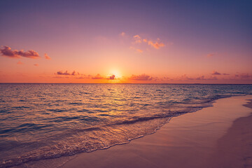 Sea sand sky concept, sunset colors clouds beachfront horizon. Inspire waves beams, meditation nature landscape, beautiful colors, wonderful scenery of tropical beach. Beachside travel summer vacation