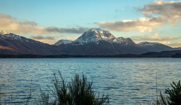 View of Slioch, mountain range in Torridon from across Loch Maree