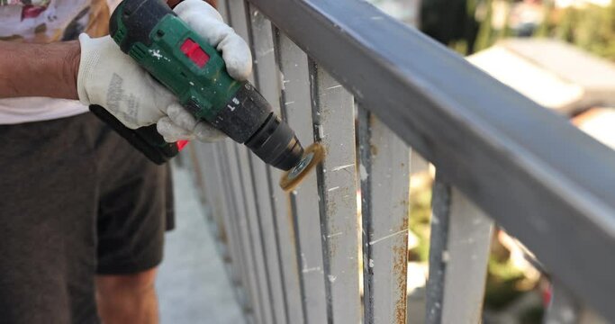 Using high speed rotary multitool to clean rusty pipe