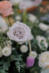 Conceptual decoration for special event. Gathering. Family dinner. Private party. Celebration. Table flower. Long table. Table Setting. With drop light. Outdoors. Details. 