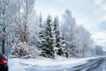 Road in winter landscape in Hassleholm, Sweden