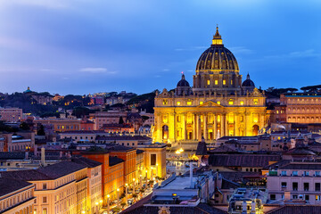 Saint Peter Basilica in Vatican City at Rome, Italy and Street Via della Conciliazione at sunset sky.