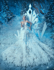 Art photo real people Fantasy woman snow queen sits on ice throne, white long dress train bird...