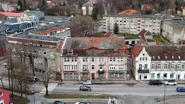 Facade of German built house in the 19s building in the old market square of Silute, Lithuania. Pre-War architecture.