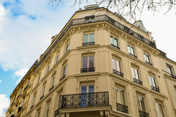 typical parisians building facade , haussmannian style  ,5th arrondissement