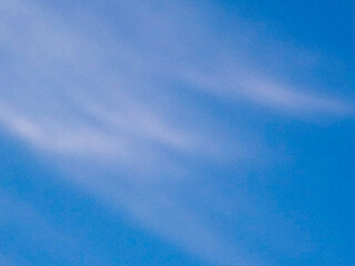 Beautiful blue sky veiled by a light white cloud