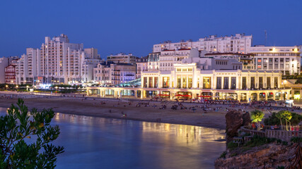 Fototapeta na wymiar Biarritz, the famous resort in France. Night view of the main beach called La Grande Plage and city skyline.