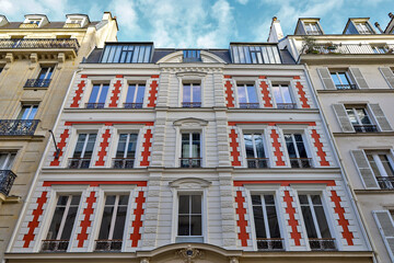 typical parisians building facade , haussmannian style  ,8th arrondissement - obrazy, fototapety, plakaty