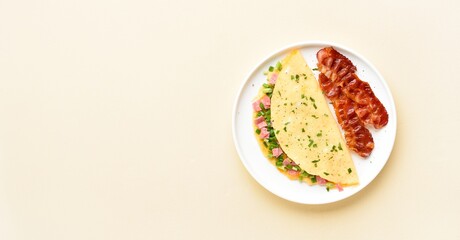 Omelette with ham, green onion and roasted bacon
